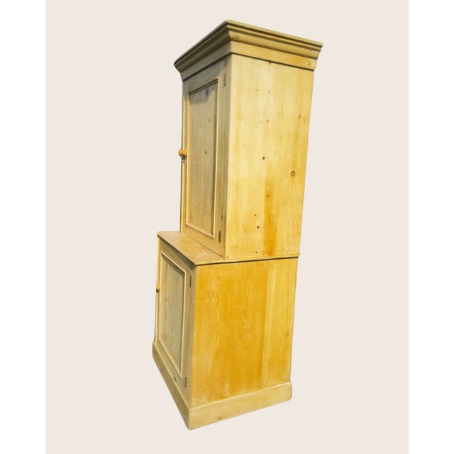 Simple, classic, straightforward housekeepers cabinet in stripped pine. Internal shelving throughout. Perfect hallway...