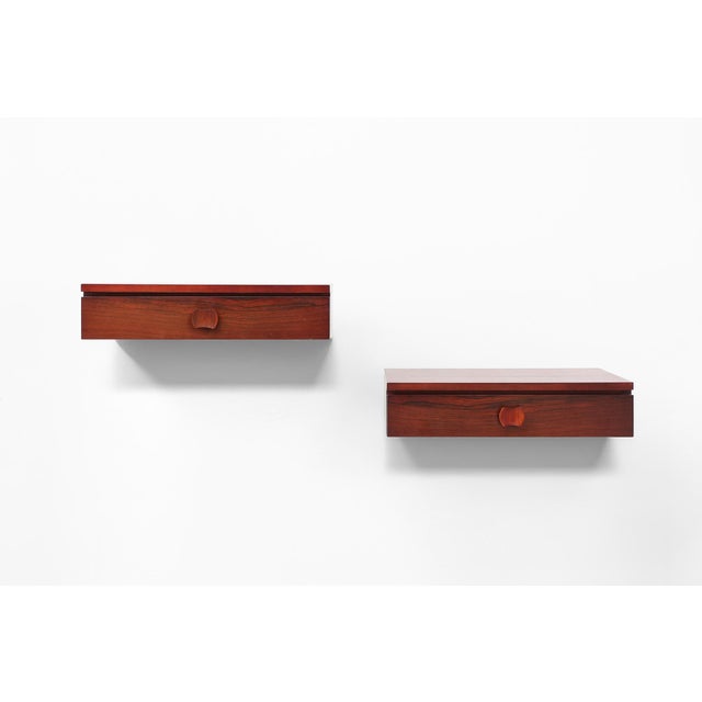 Clean-lined and highly functional, this pair of floating bedside drawers was crafted in Denmark during the 1960s....
