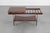 Beautiful coffee table with a geometric black lacquered metal frame and teak tops. Made in Italy, attributed to HOME...
