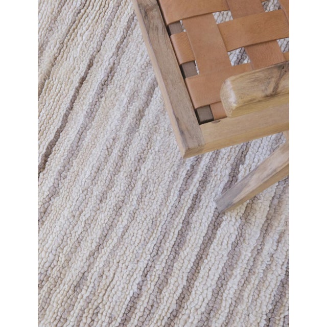 Introducing our Moroccan Kilim Beni Ourain Rug, a beautifully crafted and durable stripe rug that measures 5.2 x 3.2 ft....