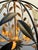 Beautifully crafted metal fixture with a georgeous black and gold finish.16x183/4" diameters and weighs 6 pounds. It came...
