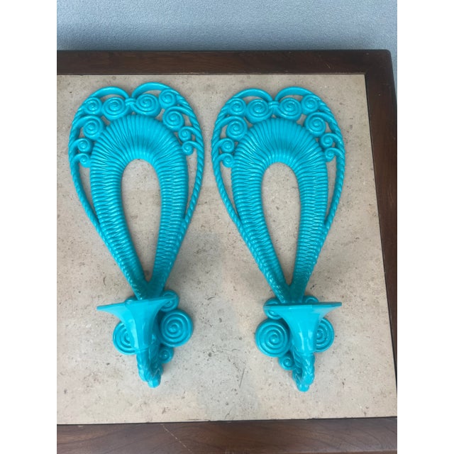 Pair of Burwood Wall Candleholders Wall sconces with a scroll wicker design. These have been painted in a high gloss blue...
