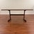 G-Plan vintage teak 'Whale Tail' dining table featuring a teak top with contrasting afromosia (African teak) trim and...