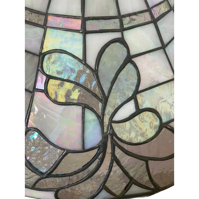 The Vintage Tiffany Style Stained Hanging Lamp Shade is a beautifully crafted piece made of stained glass with a...