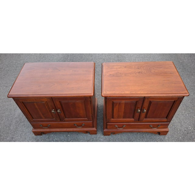 A Pair of Hooker Furniture French Chippendale Style Cherry two-door single drawer Night Tables with designer light...