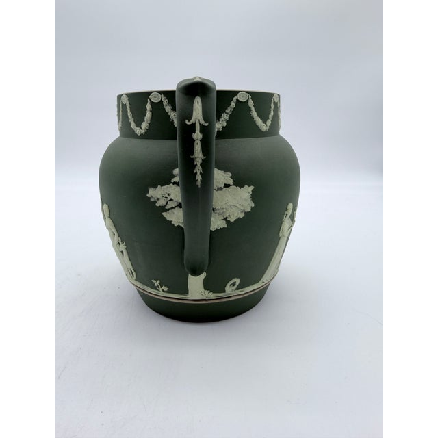 Antique Olive Green Wedgwood Jasperware Pitcher England, Circa 1891–1908 A distinguished example of Wedgwood's celebrated...