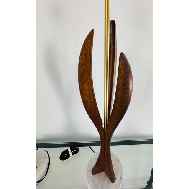 Pair of Vintage 1950s Mid Century table lamps featuring Matisse- like forms in solid walnut wood with heavy gray and white...