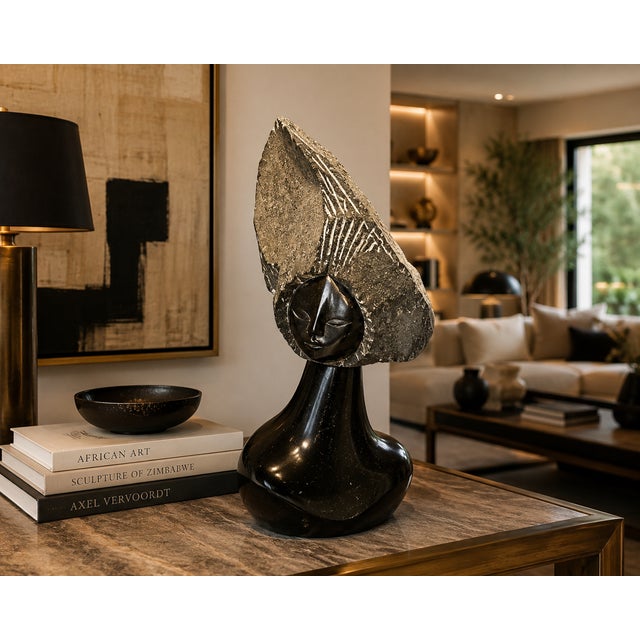 This original Lazarus Takawira sculpture carries the quiet authority that defines the finest works of the Zimbabwean Shona...