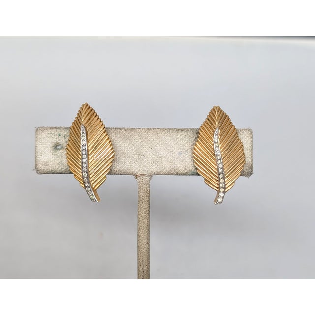 Gold Vintage 1960s Signed Crown Trifari Goldtone Clear Rhinestone Leaf Clip Earrings-2 Pieces For Sale - Image 8 of 12