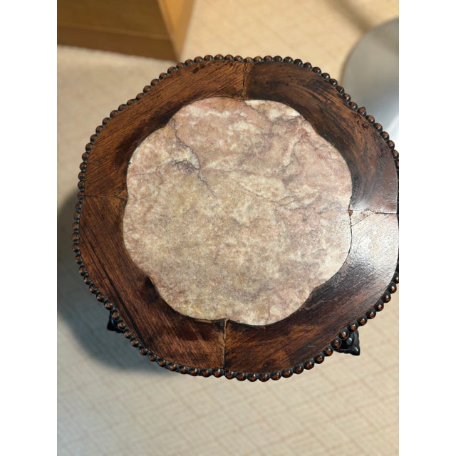 Antique hand-carved Rosewood Chinese low stand / side table with lovely pink inset marble top. The table features...