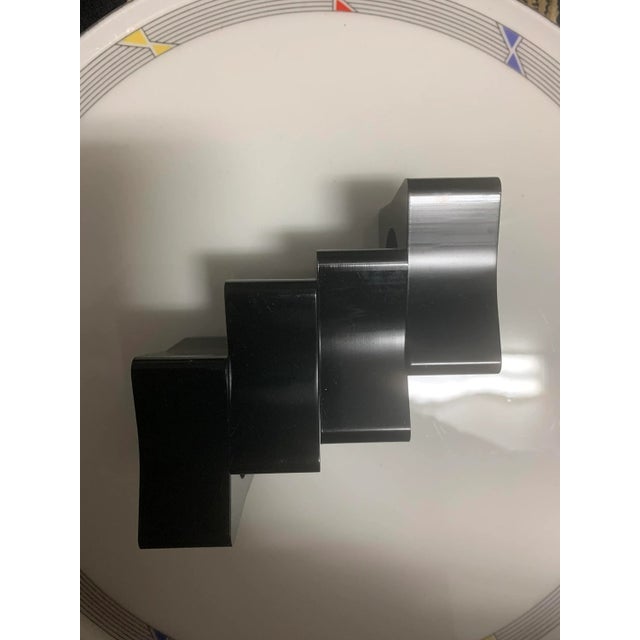 Set of 4 80s chunky mod napkin rings marked "made in taiwan" Approx 2.5" x 2.25" each Opening diameter 1.25"