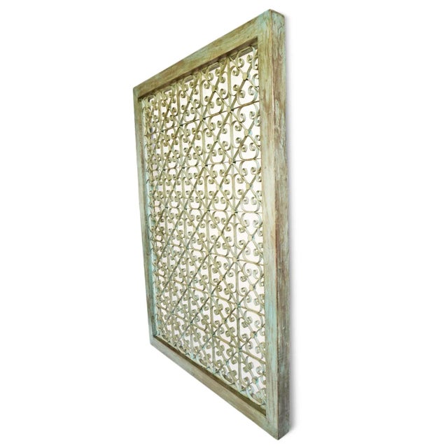 Solid teak wood frame with inset hand forged stunning iron screen. Vintage piece great for use indoors or out with...