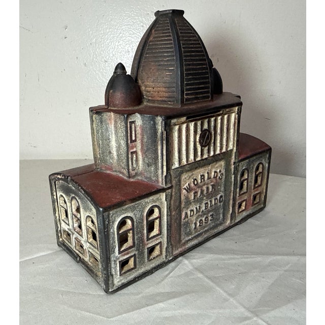 Up for sale is an exceedingly rare antique 1893 World's Fair Administration Building cast iron still bank. This original...