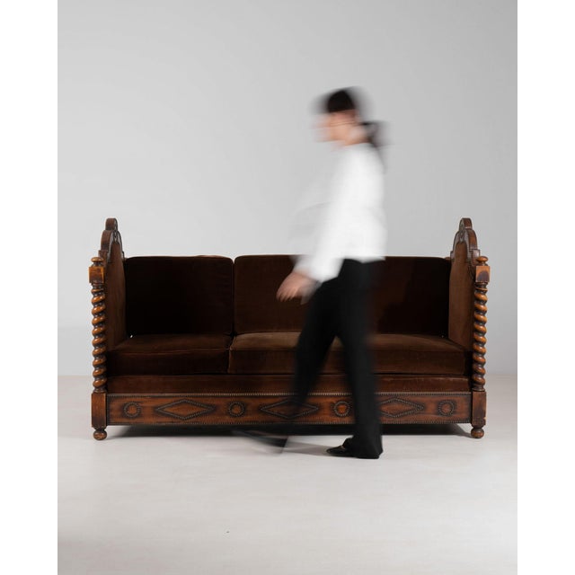 Here is a dining chair, its dark leather, brass nailhead trim, tufted button the first thing to catch the eye. Dating to...