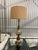 Beautiful vintage Stiffel table lamp featuring an elegant cream finish with detailed brass-tone accents. The lamp has a...