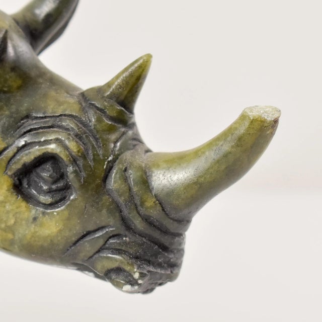 Shona stone rhino sculpture, originating from Zimbabwe and named after the Shona people, gained prominence in 1965 under...
