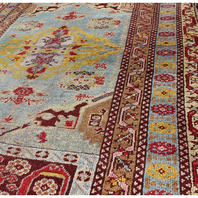 1920s Antique Turkish Oushak Rug in Light Blue Background and Border For Sale - Image 5 of 7