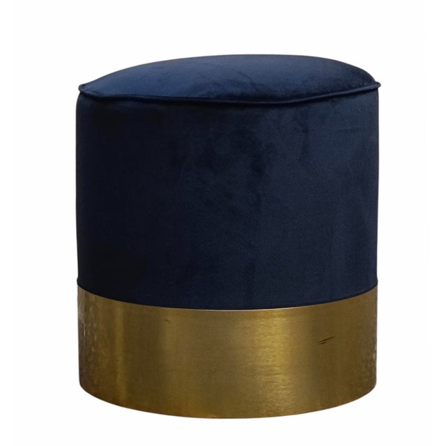 Elegant Pouffe Stool in Midnight Blue Velvet and Brass. Upholstered in soft, sumptuous midnight blue velvet, it offers...