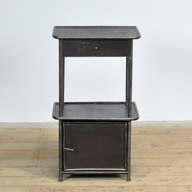 This iron bedside table exudes history and style. Originally from a hospital dating back to the 1910s, it has been...