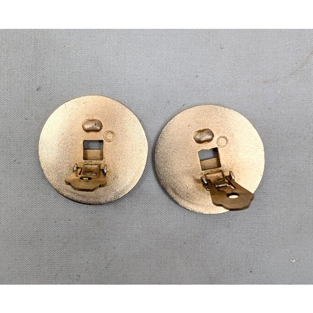 Mid-Century Modern Vintage Signed Napier Doris Day Goldtone Two Stacked Asian Coins Clip Earrings- 2 Pieces For Sale - Image 3 of 6