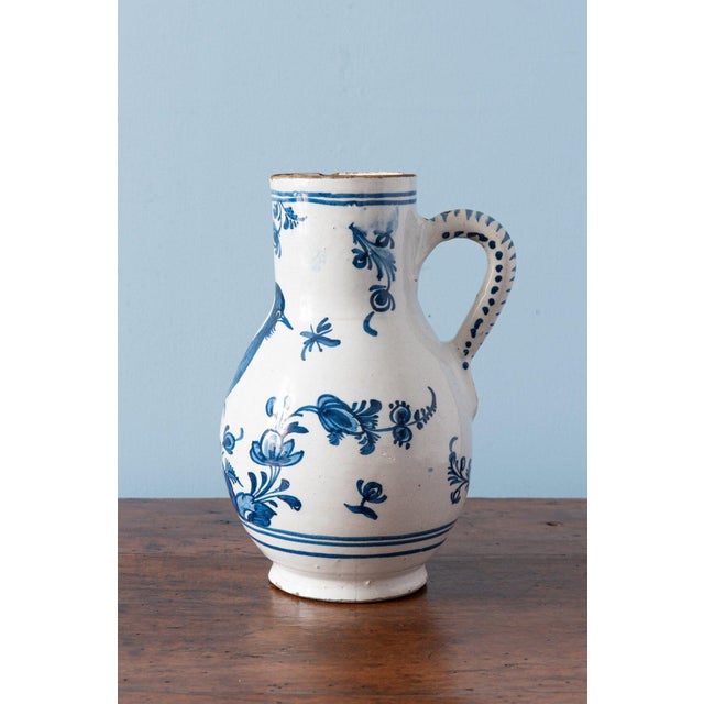 Height: 23 cm Diameter: 16 cm An external crack to the base ; some wear to the top edge, commensurate with age.