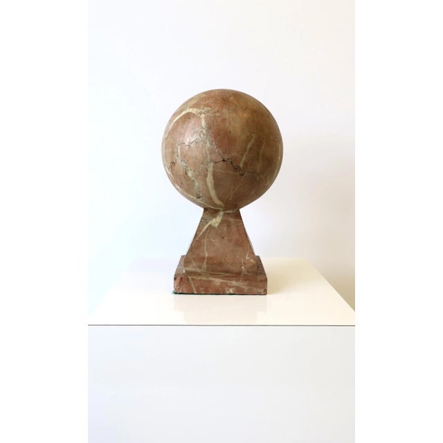 A beautiful and substantial Modern Art Deco marble sphere sculpture, circa early-20th century. Piece is made from one...