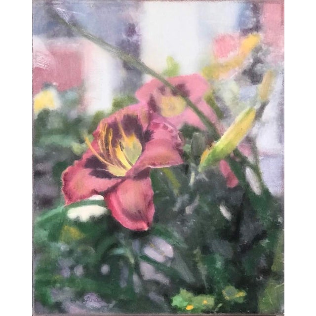 This oil on canvas artwork captures a vibrant display of blooming flowers, featuring rich hues of pink and hints of yellow...