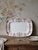 Large antique rectangular serving platter in ironstone from the Longchamp pottery, polychrome "Daisies" pattern, very...