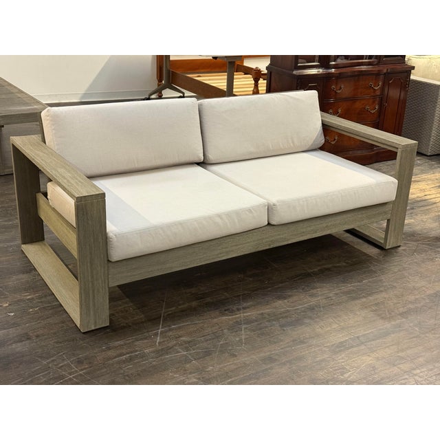 Design Plus Gallery presents a Portside Outdoor Sofa from West Elm. A contemporary two seat sofa defined by bold lines and...