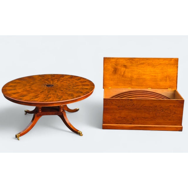 This 84" Yew Wood Jupe Dining Table with Matching Yew Wood Leaves Storage Trunk is a rare duo of ingenuity, functionality,...