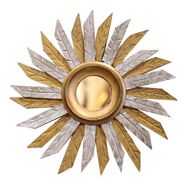 Add a beautiful shine to your home with this eye-catching vintage sun mirror. Hand carved in France circa 1990, the mirror...