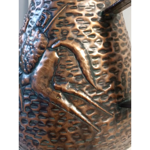 Made in Italy, 1960s. This umbrella stand is hand-made in copper. It is a vintage piece, therefore it might show slight...