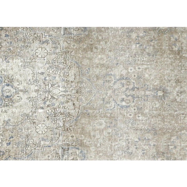 1940s Persian Tabriz Rug. Hand woven in the Tabriz region of Northern Iran. Distressed and refinished in the U.S. These...