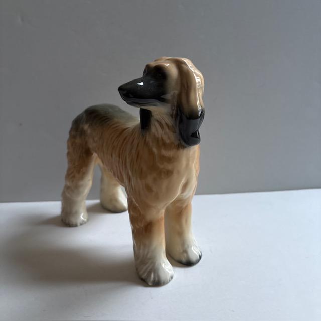 Beautiful mid-century dog figurine featuring the majestic Lhasa Apso or Afghan Hound breed. Made by Coopercraft of...