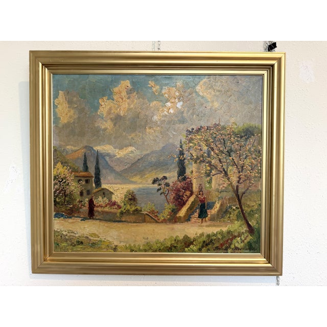 This beautiful original oil painting by Finn Wennervald captures the tranquil beauty of a flowering lakeside village...