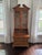Beautiful Trouvailles Inc of Watertown, MA burlwood secretary. The upper cabinet has divided glass doors, opening to an...