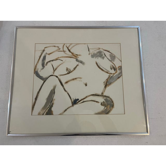 A nice pastel drawing of a reclining female nude in brown and gray colors. From a Woodstock New York studio. In a metal...