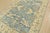 A modern traditional Oushak rug, hand-knotted with fine wool on a cotton foundation. This area rug features a central...