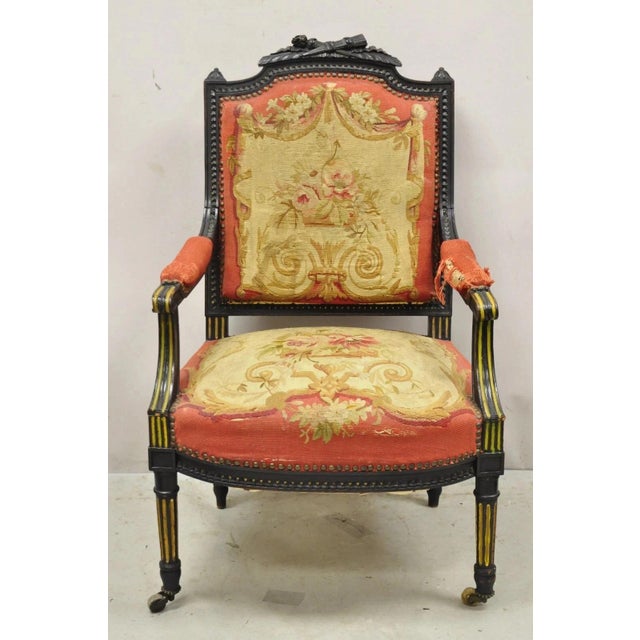 Antique French Empire Black Ebonized Walnut Needlepoint Parlor Arm Chair. Circa Late 19th Century. Measurements: 39.5" H x...