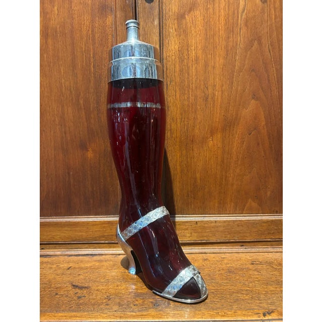 Rare "shake a leg" ruby glass cocktail shaker and original matching glasses made in 1937 by the West Virginia specialty...