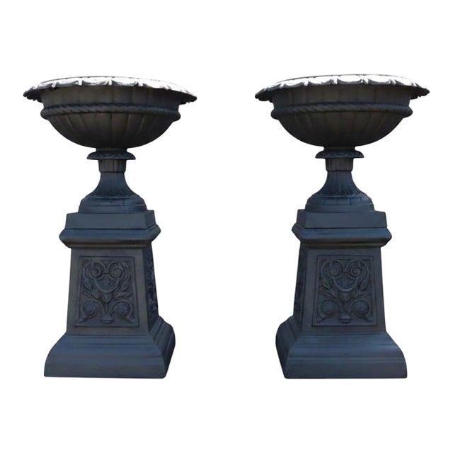 Pair of Antique Cast Iron Garden Urns With Stylized Floral Bases C1900 For Sale