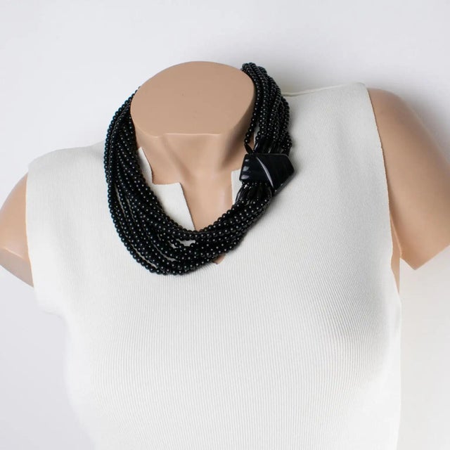 This stunning Angela Caputi, made in Italy, is a resin choker beaded necklace with an oversized multi-strand design with...