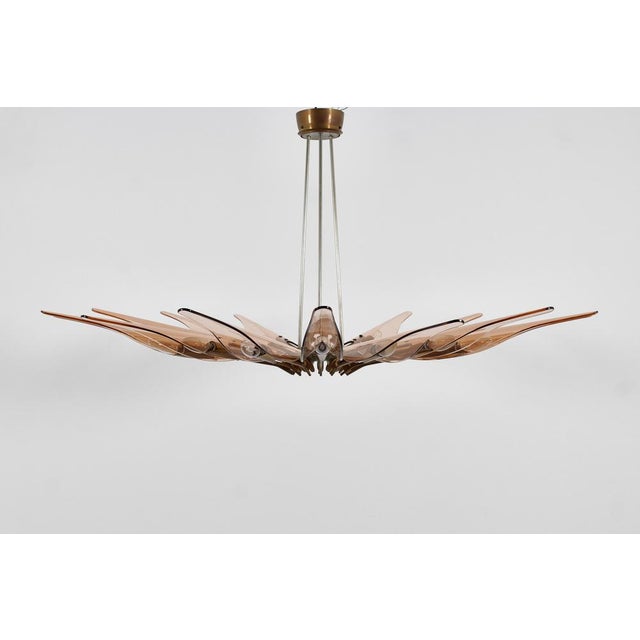 Very rare "Dahlia" chandelier, model "1563", designed by Max Ingrand for Fontana Arte in the 1950s is one of the most...