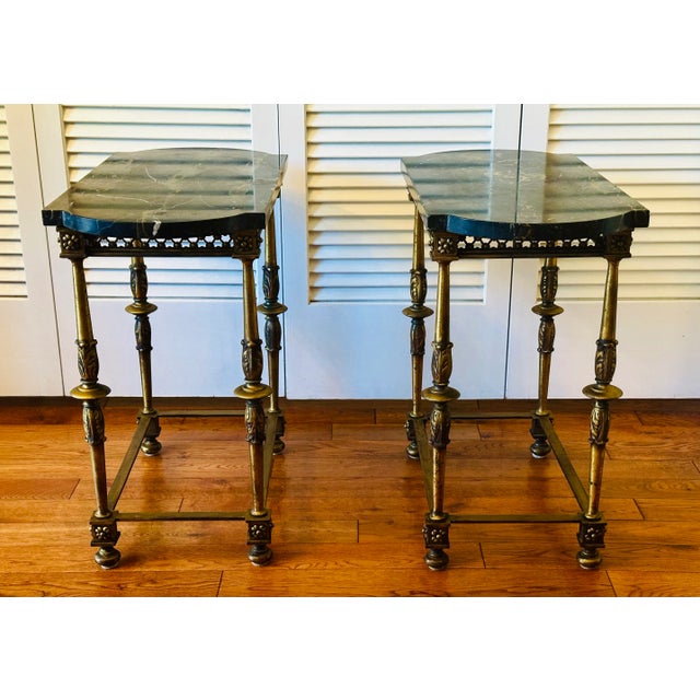 A pair of Italian Portoro marble top side tables with ornate gilded metal base that they could be used as lamp tables ,...