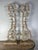 A pair of 19th-century carved Italian architectural elements mounted on wood bases. The Rococo style carvings showcase...