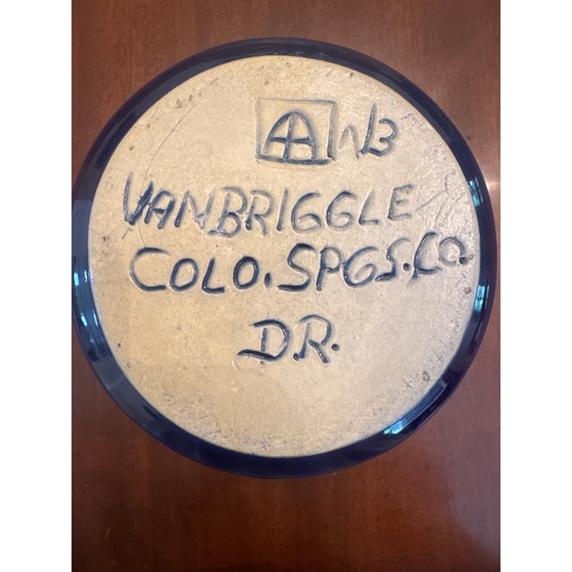Van Briggle Pottery was established in Colorado Springs, Colorado by Artus and Anne Van Briggle. Both were accomplished...