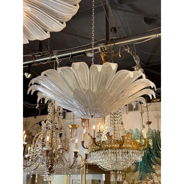 This is a stylish Modern Murano flush mount chandelier featuring frost glass in a unique flower form design. The...