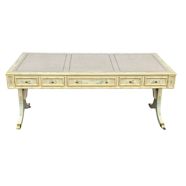 Stunning faux bamboo creme and blue painted desk. The desk is a statement piece. It can sit in the middle of the room as...