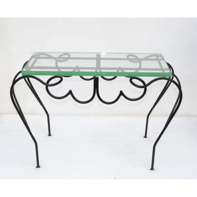 Iconic 1930 Jean Prouvé Black Wrought Iron and Glass Side, End or Sofa Table made in France in 1930. Comes with the...