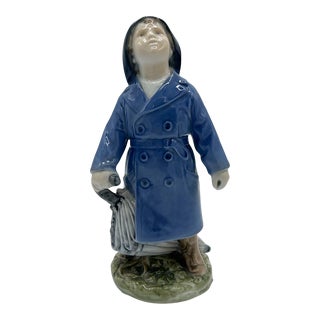 1960s Royal Copenhagen Porcelain Figurine “Boy With Umbrella” For Sale